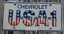 Vintage original Chevrolet gm dealer ship License Plate Usa-1 tag